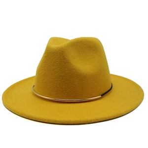 Stylish yellow wool fedora hat featuring a gold and black metallic ring band accent