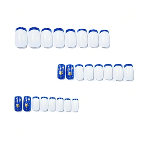 French tip press-on nails in blue and white with gold star patterns, 24 piece set