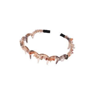 Acrylic headband with irregular colorful stones and wavy frame for a stylish summer look