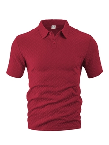 Detailed macro view of the dark red men's Polo shirt with herringbone jacquard texture
