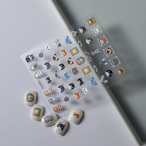 Detailed 5D embossed cat nail art stickers featuring variety of cute kittens and paw prints