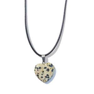 Macro shot of 20mm heart-shaped spotted jasper pendant with black cord and metal clasp