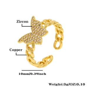 Detail of 10mm butterfly ring in gold-plated copper with sparkling zircon inlay