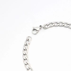 Detail of silver stainless steel chain with a secure lobster clasp closure