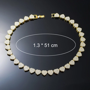 Close-up of gold heart Cuban link necklace with full rhinestones and 1.3 x 51 cm dimensions