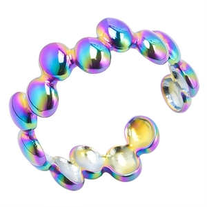 Detail of rainbow plated open ring with a series of polished spherical bubble textures