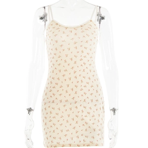 White mini dress with red floral print featuring a V-neck and delicate lace trim details