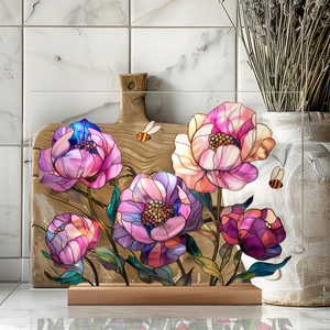 Close-up of a floral acrylic desk decor with peony patterns and a natural wooden base