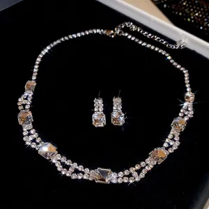 Luxury square crystal pendant necklace and earrings set with shimmering rhinestones