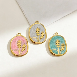 Gold-plated stainless steel flower pendants with pink, grey and teal enamel in oval shape