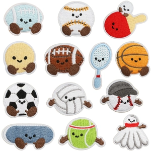 Detailed view of assorted mini sports ball embroidery patches on a clean white surface