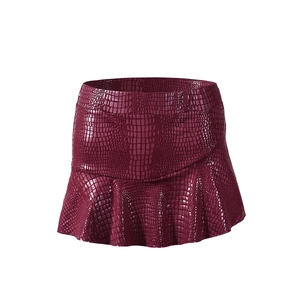 Close-up of burgundy faux leather mini skirt with crocodile texture and ruffled hem