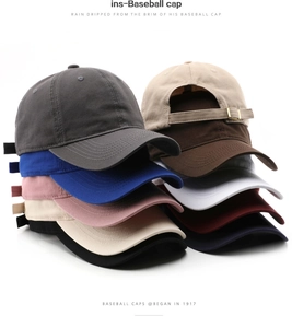 Multiple colors of washed cotton baseball caps with adjustable metal buckles