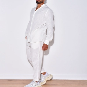 Men's white linen long sleeve casual shirt and trousers set shown in full body view