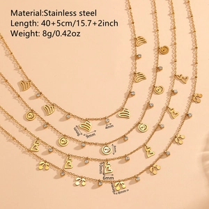Set of four 18K gold plated stainless steel necklaces with heart and cherry charms