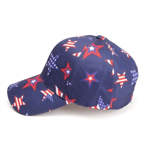 Close-up of a blue baseball cap with red and white star patterns and curved brim