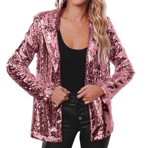 Detailed close-up of rose gold sequin blazer featuring notched lapels and shimmering texture