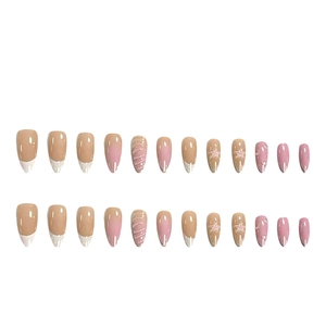 Pink gradient almond press-on nails with white French tips and 3D snowflake textures