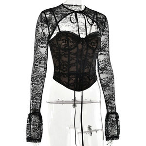 Detail of black lace long sleeve top featuring flared cuffs and delicate tie-up neckline