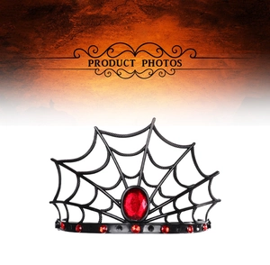 Detail of gothic spider web crown with a large red crystal for Halloween costume