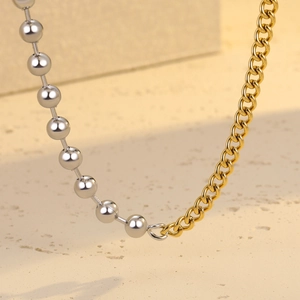 Two-tone stainless steel necklace set with gold and silver bead and loop chain links