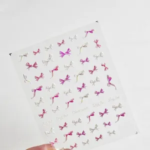 Self-adhesive 5D embossed nail art stickers with pink and white bow tie designs
