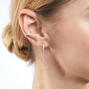 Silver S925 chain tassel earrings with micro-set zircons shown on model