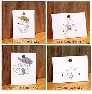 Detailed grid showing jewelry display cards with abstract line art faces and size specs