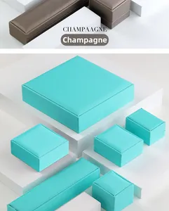 Detailed set of premium brushed PU jewelry boxes in champagne gold and mint green colors