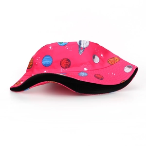 Detail of rose red sun hat with colorful space planet patterns and galaxy star prints