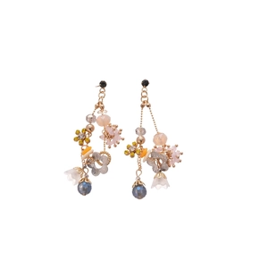 Elegant gold earrings with colorful floral beads and crystals on white background