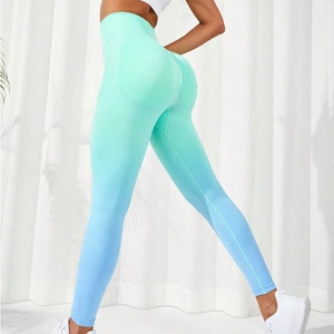 Detail of high-waist gradient yoga leggings showing seamless knitting and peach lift effect