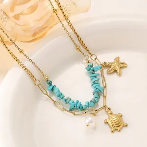 Bohemian gold layered necklace with starfish, turtle charms, pearls and turquoise stones