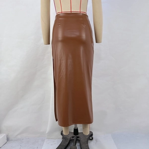 Detailed view of the high-waist PU leather skirt featuring a side slit and ruched texture