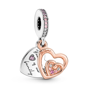 Silver and rose gold Mom heart pendant engraved with You are the heart of our family