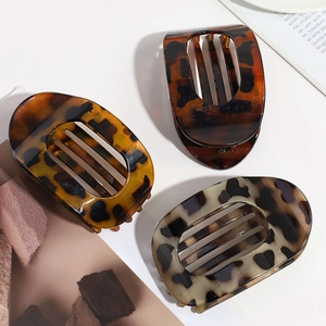 Three-piece leopard print hair claw clips set in oval hollow design for women