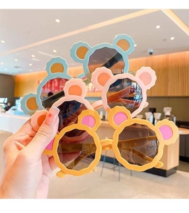 Cute cartoon bear ear sunglasses for kids in various bright colors for sun protection.