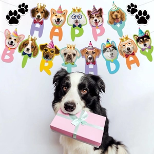 Dog themed happy birthday banner set featuring cute cartoon puppy faces and paw prints
