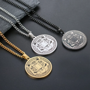 Tiger head circle pendants in gold silver and black steel with Greek key border