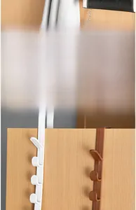 Over-the-door hooks for bags and clothes, showing white and brown hangers on wooden doors