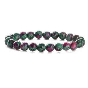 Natural ruby in zoisite beaded bracelet with green and red mineral stones on white background