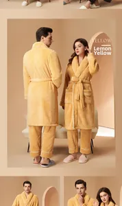 Detail of lemon yellow thick fleece bathrobe set with white piping and waist tie