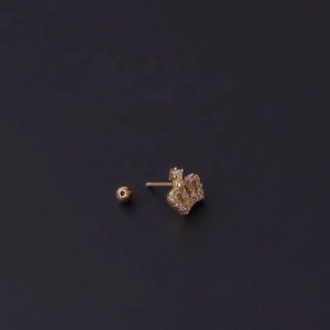 Macro shot of gold crown stud earring with clear zircon crystals and ball back