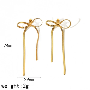 Golden bow heart earrings in 18k plated stainless steel with 74mm drop length