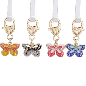 Colorful enamel butterfly pendants with gold heart lobster clasps in four vibrant shades