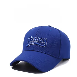 Detail of embroidered Ramax REALIZE lettering on royal blue cotton baseball cap
