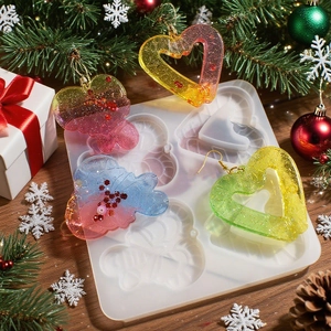 DIY Christmas resin silicone mold for heart and angel wing pendants with glitter ornaments