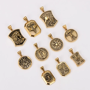 Collection of ten 18k gold plated 304 stainless steel pendants with various embossed motifs