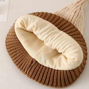 Winter knitted baby hat with soft beige lining and two-tone brown ribbed knit design