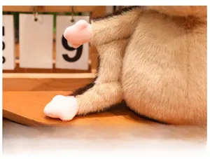 Detailed view of the soft brown plush texture and thick cotton filling of sugar glider toy